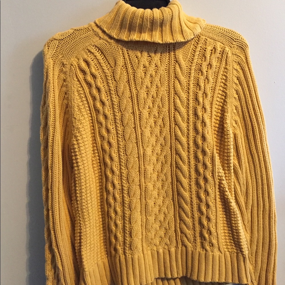 Yellow turtleneck sweater